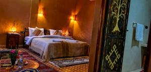 Postel nebo postele na pokoji v ubytování Oasis Tilogui - Luxury hotel in Zagora