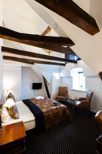 Katil atau katil-katil dalam bilik di Milling Hotel Saxildhus