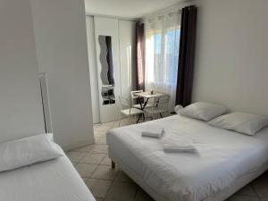 A bed or beds in a room at La douceur au coeur des chateaux de la Loire