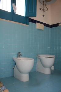 Et badeværelse på Il Giardino Del Corso