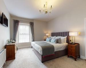 Letto o letti in una camera di Newbay House Wexford