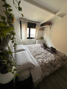 a bedroom with a bed and a window at DEA DREAMS Marghera 43 in Milan