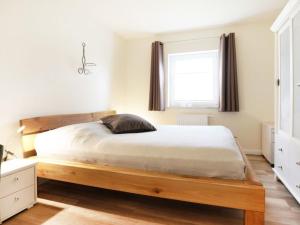 Postel nebo postele na pokoji v ubytování Brise Ferienwohnung + 16 fotografií