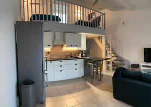 Kuchyň nebo kuchyňský kout v ubytování Beau Duplex T3 vue panoramique Luberon