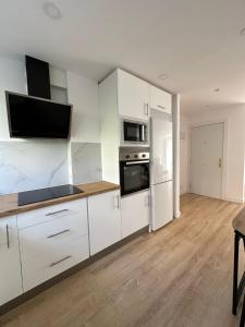 Kuchyň nebo kuchyňský kout v ubytování Apartamento céntrico Alba + 32 fotografií