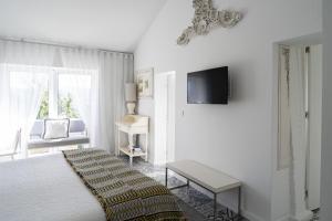 Postel nebo postele na pokoji v ubytování CoimbraAmeias
