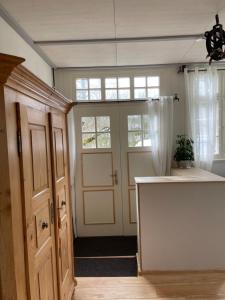 a room with a white door and a window at Ferienwohnung am Stockerbach in Freudenstadt