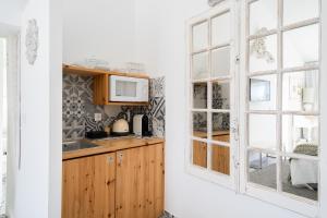 Kuchyň nebo kuchyňský kout v ubytování CoimbraAmeias