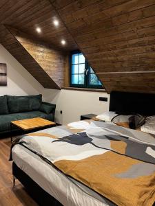 Tempat tidur dalam kamar di Apartmány Vlachovice
