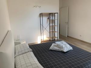 Postel nebo postele na pokoji v ubytování Appartamenti Lilla