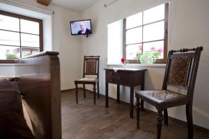 TV a/nebo společenská místnost v ubytování Pension Alte Schmiede