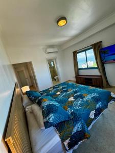 Giường trong phòng chung tại Juan Dolio, Beach Access 2 BR Apt Salitre Tower front of Club Hemingway