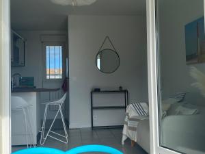 VUE MER et SOLEIL LEVANT AU BELVEDERE客房内的一张或多张床位