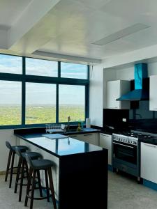 Nhà bếp/bếp nhỏ tại Juan Dolio, Beach Access 2 BR Apt Salitre Tower front of Club Hemingway