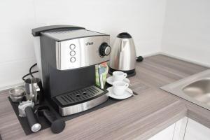 Příslušenství pro přípravu čaje a kávy v ubytování Puglia, Manfredonia nel cuore del Gargano