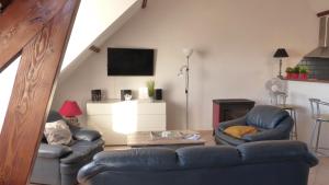 Posezení v ubytování Appartement tout confort avec vue sur mer + 46 fotografií