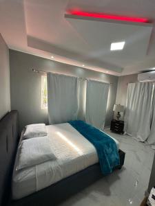 מיטה או מיטות בחדר ב-Villa Francisca S.J