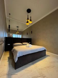 Ένα ή περισσότερα κρεβάτια σε δωμάτιο στο LUX Евродвушка