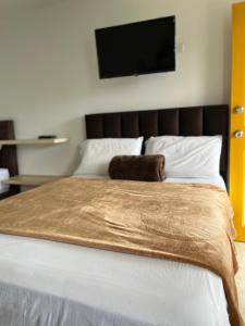 Postel nebo postele na pokoji v ubytování CASONA HOTEL LA DIVISA