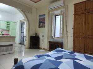 Кровать или кровати в номере Ta' Marija Home