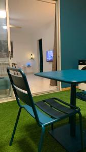 TV a/nebo společenská místnost v ubytování Appartement Ciel et Mer