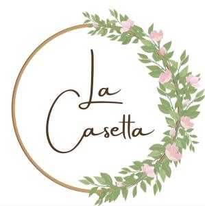 een bloemenkrans in een gouden cirkel met het woord agoria bij B&B La Casetta in Rome