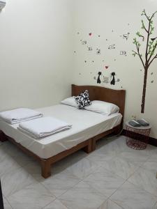 Katil atau katil-katil dalam bilik di Happy Home Backpacker