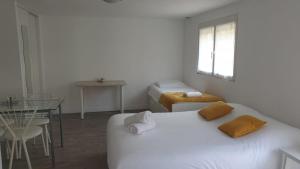 Posteľ alebo postele v izbe v ubytovaní Tours, Touraine et Chateaux de la Loire
