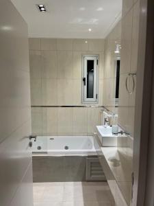 Kylpyhuone majoituspaikassa HOTEL & SPA JAMAX