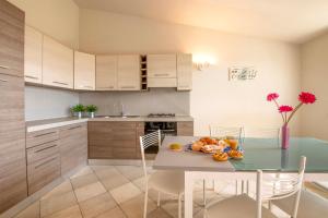 Kuchyň nebo kuchyňský kout v ubytování Casa Vacanze Vignarca - Località Perelli