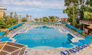 Kolam renang di atau dekat dengan Caesar Dreamland Apartment +8 gambar