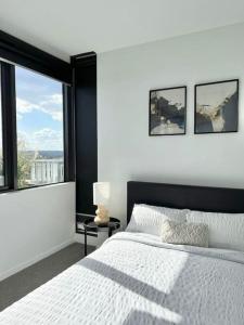 Легло или легла в стая в Ivanhoe Apartment 2BR Urban Oasis