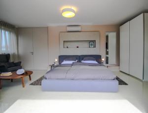 Ένα ή περισσότερα κρεβάτια σε δωμάτιο στο Villa Terra Rossa Borik +43 φωτογραφίες