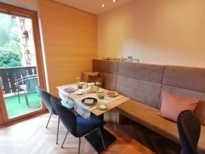 a dining room with a table and chairs at Haus Marion Haueis in Sankt Anton am Arlberg