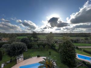 an overhead view of a park with a swimming pool at The Tower Roma in Rome