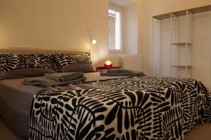 Letto o letti in una camera di Maison62