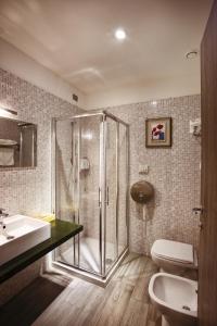 Koupelna v ubytování Igiban Hotel
