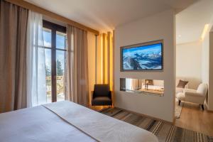 Postel nebo postele na pokoji v ubytování Likoria Hotel