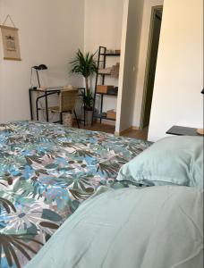 Katil atau katil-katil dalam bilik di La Maison d’Aromarie