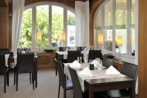 
Ein Restaurant oder anderes Speiselokal in der Unterkunft Aparthotel-aarau-WEST Swiss Quality 
