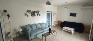 Гостиная зона в Pool Seaside Relais - VILLE Ninfea, Marea, Rosa e Cassiopea