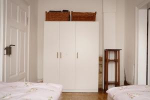 Ein Bett oder Betten in einem Zimmer der Unterkunft Besondere Ferienwohnung in Königslutter am Elm