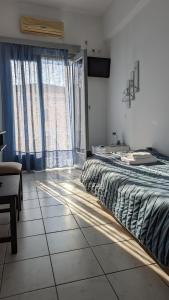 Voodi või voodid majutusasutuse Hotel Theoxenia toas