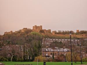 a castle on top of a hill with buildings at Beck's Sunset Accommodation in Dover