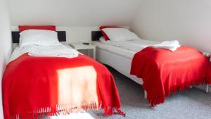 Postel nebo postele na pokoji v ubytování Hotel Smedegaarden