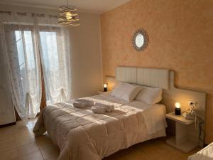 Postel nebo postele na pokoji v ubytování Albergo Panoramica + 37 fotografií