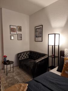 En eller flere senge i et værelse på Moderne Wohnung in Hagen