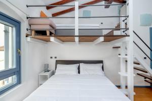 Ліжко або ліжка в номері Villa Zanina