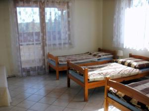 En eller flere senge i et værelse på Ferienhaus Villa Regina