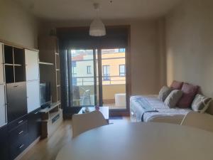 Kuchyň nebo kuchyňský kout v ubytování Apartamento en urbanización con piscina en Playa de Silgar